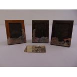 Asprey three silver mounted rectangular wooden photograph frames and a silver plaque engraved with