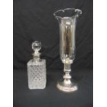 A silver mounted cut glass decanter and Christophle silver plated storm lantern