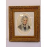 A framed and glazed oval watercolour of a 19th century lady, 24 x 17cm