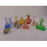 A quantity of Art Deco coloured glass perfume bottles, an atomiser and a miniature decanter (9)