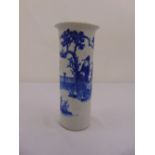 A Chinese blue and white cylindrical vase decorated with figures in a landscape, marks to the base