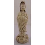 A Chinese Guanyin blanc de chine figurine, signed to verso