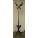 A mahogany bentwood hat and coat stand of traditional form