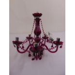 A Murano style purple glass five branch chandelier