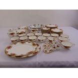 Royal Albert Old Country Roses dinner service to include plates, bowls, serving dishes for twelve