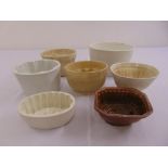 A quantity of porcelain jelly moulds of various shape and form (7)