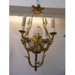 A Victorian gilded metal four branch chandelier with cut glass central bowl