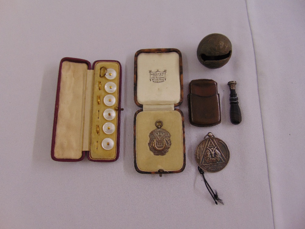 A quantity of collectables to include two silver medals, dress buttons, a seal and a leather vesta