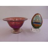 An art glass bowl and a hand-painted Russian egg shaped glass on a perspex stand
