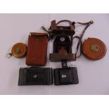 A Vintage Zeiss Ikon folding camera in leather case, a No2 folding Autographic Brownie camera and