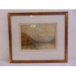 A framed and glazed 19th century watercolour of two boats on a lake with mountains in distance,