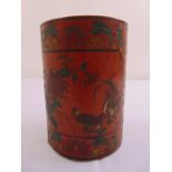 A Chinese papier mache cylindrical brush pot decorated with birds and foliage