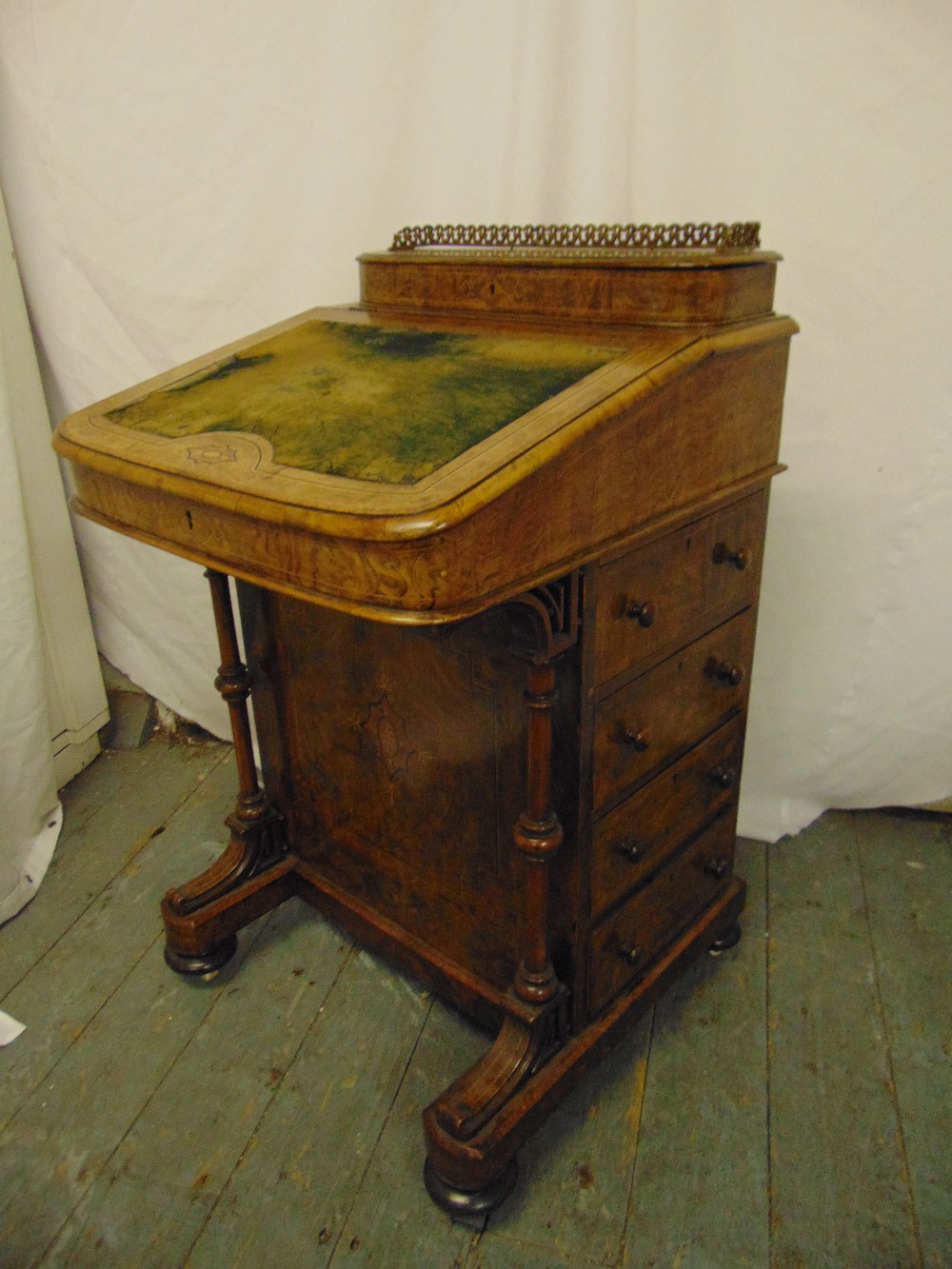 A Victorian walnut Davenport, rectangular inlaid with pierced brass gallery, four drawers to one