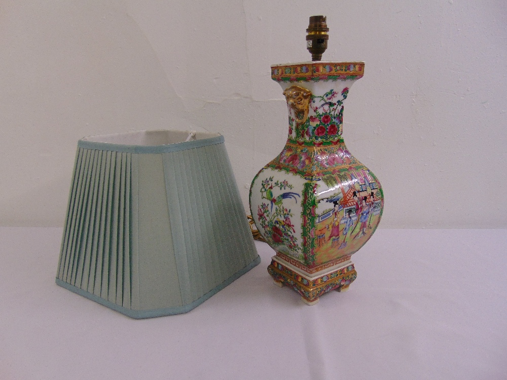 A late 19th century Cantonese vase decorated with flowers and leaves, converted to a table lamp,