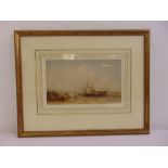 A framed and glazed 19th century watercolour of a coastal scene with sailing boats and quay, 15 x