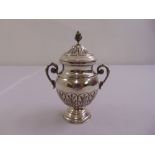 A continental white metal two handled cup and cover, stamped 800