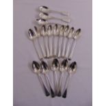 A quantity of Georgian and Victorian silver Old English and fiddle pattern dessert spoons (17)