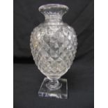 A Baccarat ovoid hand cut lead crystal vase stamped to the square base Musee des Cristalleries of