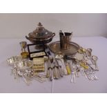 A quantity of silver plate to include a tray, soup tureen, ice bucket and flatware