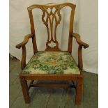 A George III mahogany childs chair with pierced splat, tapestry seat on four rectangular legs
