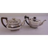 A Regency silver teapot with gadrooned rim on four lion claw feet, Charles Price London 1819 and a