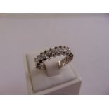 A white gold and diamond 3/4 set eternity ring, approx total weight 4.7g