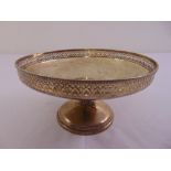 A silver fruit stand with scroll pierced border on raised circular base, Sheffield 1923 by Mappin