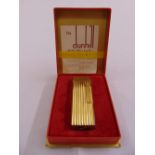 Dunhill gold plated cigarette lighter in original fitted case