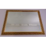 A gilt framed bevel edge rectangular wall mirror, 73 x 104cm