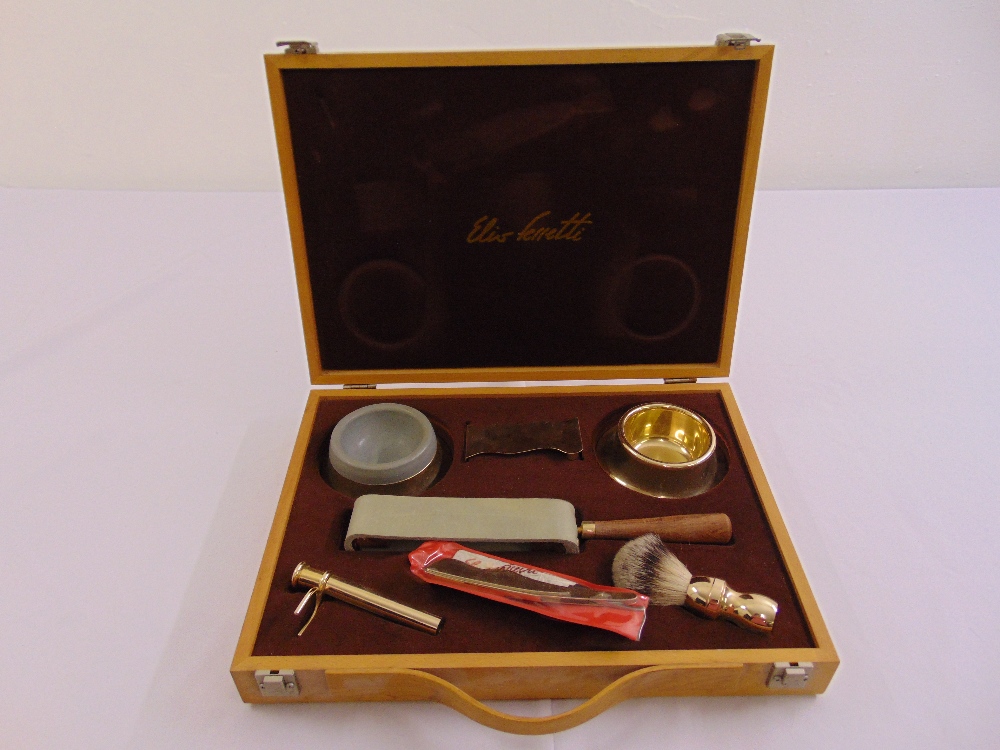 A cased gentlemans shaving kit to include razor and accessories