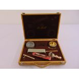 A cased gentlemans shaving kit to include razor and accessories