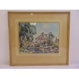 A framed and glazed watercolour of a cottage by a river, indistinctly signed, 27 x 34cm