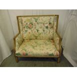 A 19th century rectangular stained wooden upholstered two seater settle