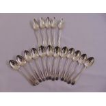 Twelve Victorian silver bead edge dessert spoons and five silver grapefruit spoons