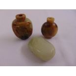 Three Oriental jade snuff bottles of various shape and form