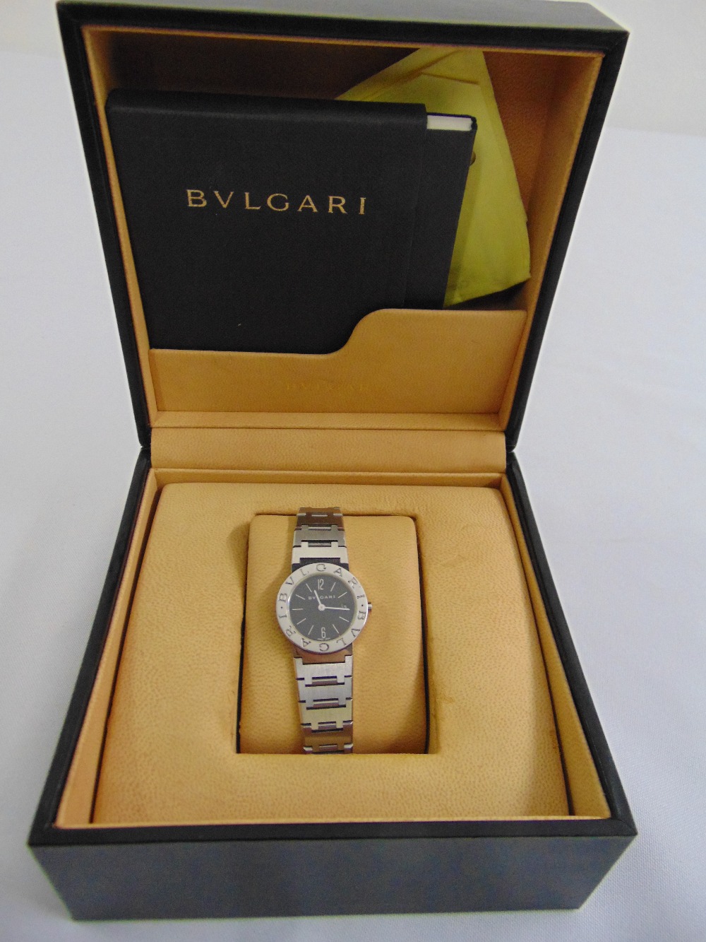 A Bulgari ladies watch with articulated strap in original fitted case and documents