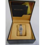 A Bulgari ladies watch with articulated strap in original fitted case and documents