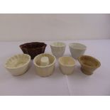 A quantity of porcelain jelly moulds of various shape and form (7)