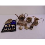 A quantity of silver and white metal to include niello work cigarette box, a teaset, condiments