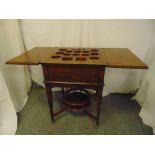 A mahogany rectangular occasional table cum drinks stand, on four tapering rectangular legs
