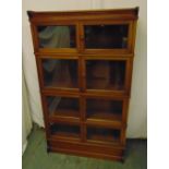 An early 20th century Globe Wernicke style mahogany glazed bookcase by Simpoles of Manchester and