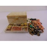 A quantity of costume jewellery to include brooches, earrings, rings and necklaces