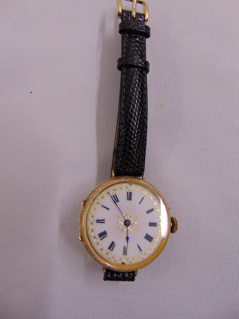 15ct yellow gold wristwatch on leather strap