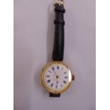 15ct yellow gold wristwatch on leather strap