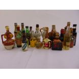 A quantity of twenty eight miniature alcohol bottles