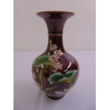 A Chinese baluster vase decorated with flowers and leaves, marks to the base