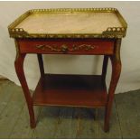 An Epstein rectangular mahogany two tier side table with pink marble top and gilded metal gallery on