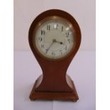 An Edwardian mahogany inlaid mantle clock, white enamel dial with Arabic numerals