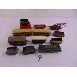 A quantity of playworn O gauge to include an engine and rolling stock (12)