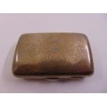 A silver cigarette case, rounded rectangular with hinged cover